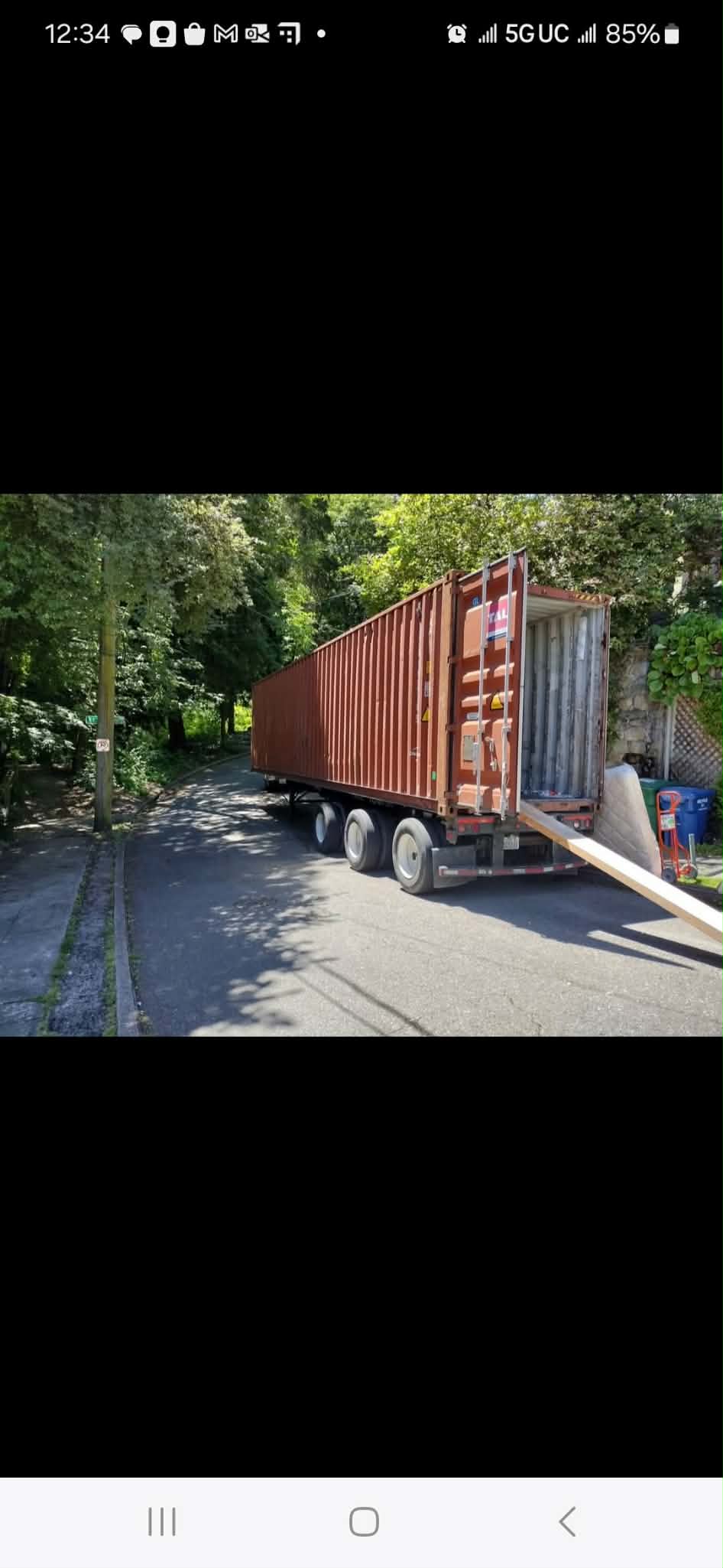 Shipping container on truck for long-distance move