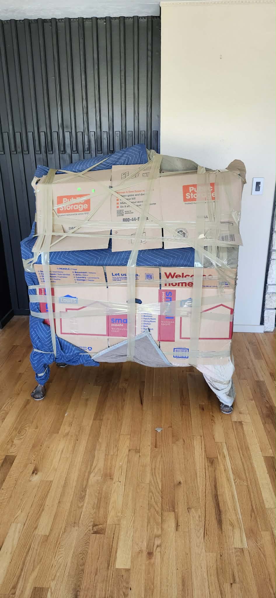 Large furniture item fully wrapped and protected